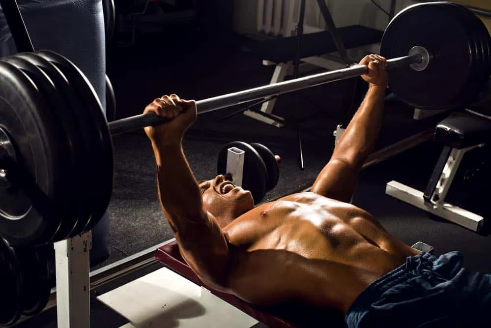power athletic guy , execute exercise press with weight
